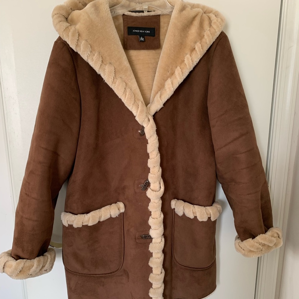 Fur-lined and fur trim winter coat.